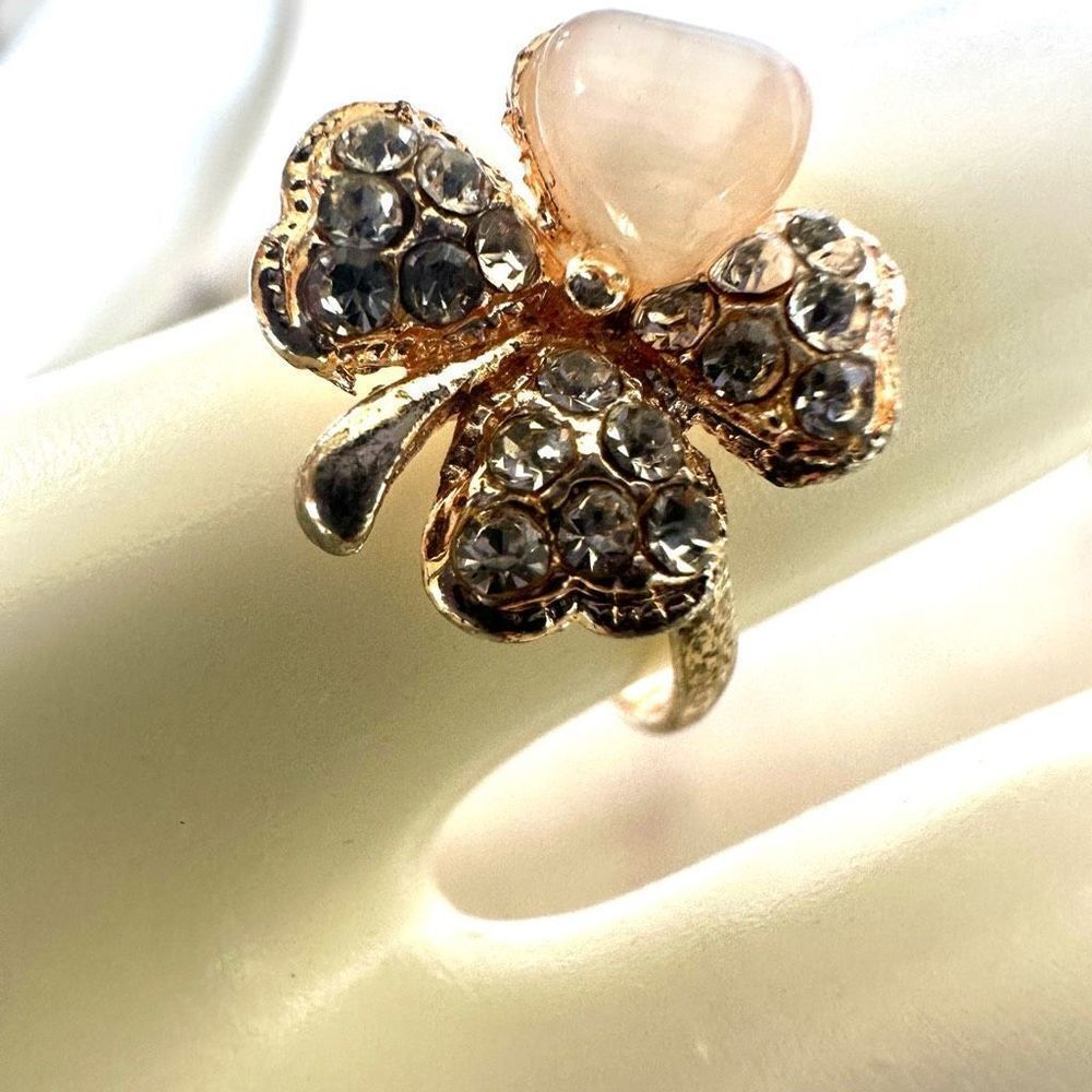 Gold tone rhinestone four leaf clover ring